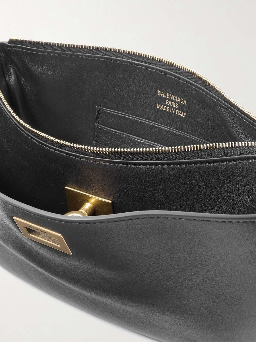 Close-up of Balenciaga shopping bags hardware and fine stitching