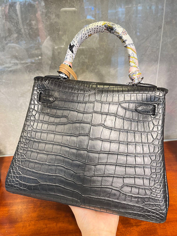 Side view of contemporary structured handbag