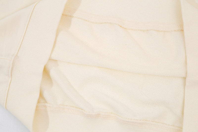 Side profile of Gucci luxury clothing with contemporary cut