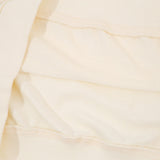 Side profile of Gucci luxury clothing with contemporary cut