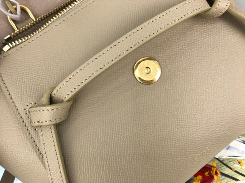 Side profile of everyday-luxe structured women's handbag – women's statement bag