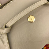 Side profile of everyday-luxe structured women's handbag – women's statement bag