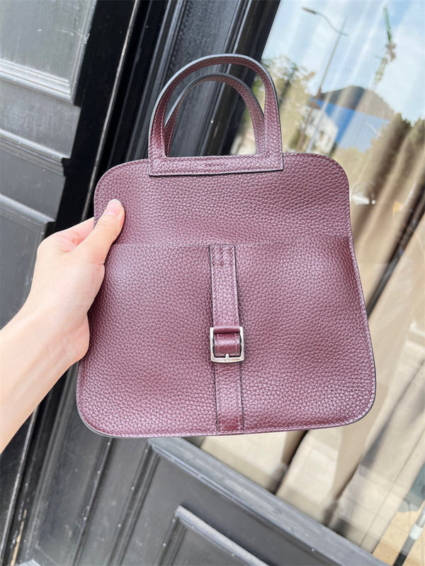 timeless top-handle bag styled with outfit
