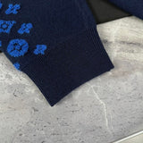 Back view of Louis Vuitton luxury clothing with contemporary cut