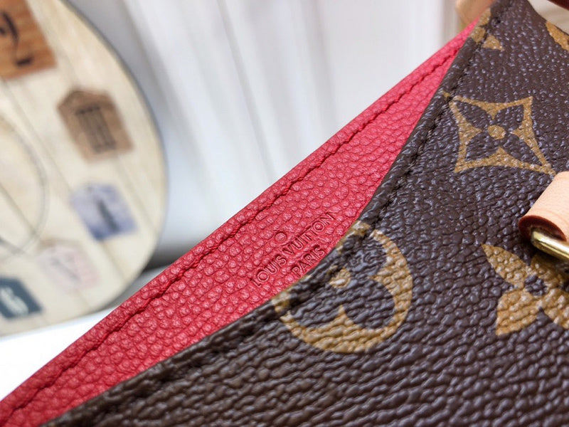 Handle and strap detail of polished elevated women's handbag – women's designer-style accessory
