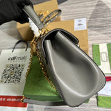 Side view of tailored structured handbag