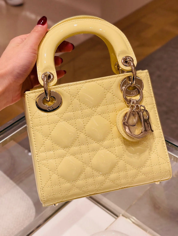 Styled lifestyle shot of structured signature women's handbag – women's designer-style accessory