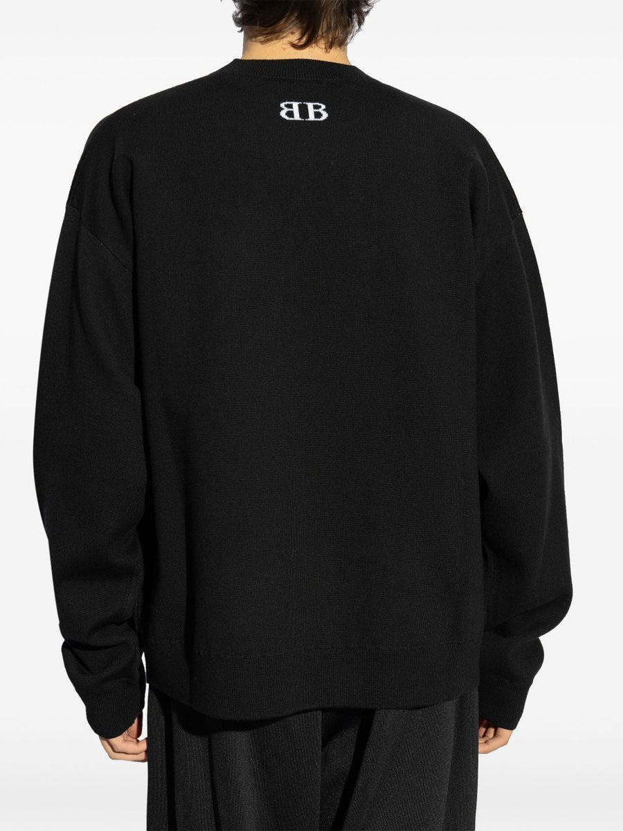 Close-up of Balenciaga jerseys & knitwear hardware and fine stitching