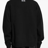 Close-up of Balenciaga jerseys & knitwear hardware and fine stitching