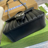 Styled lifestyle shot of refined signature women's handbag – women's luxury accessory