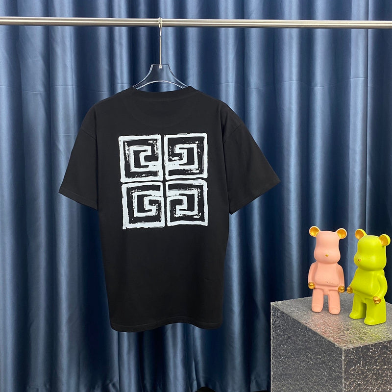 Close-up detail shot of Givenchy luxury clothing with monogram-inspired silhouette