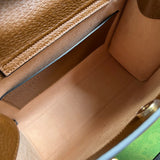 Side profile of sleek modern women's handbag – women's statement bag
