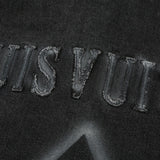 Close-up detail shot of Louis Vuitton luxury clothing with everyday silhouette
