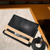 Side view of clean-lined structured handbag