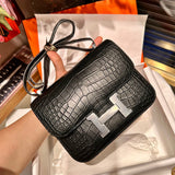  signature satchel styled with outfit