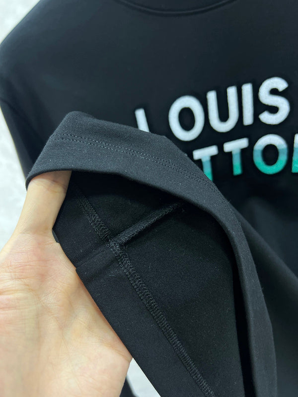 Back view of Louis Vuitton luxury clothing with monogram-inspired silhouette