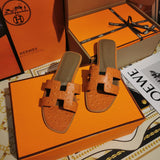 Hermès Burgundy Gladiator Sandals - Angled View