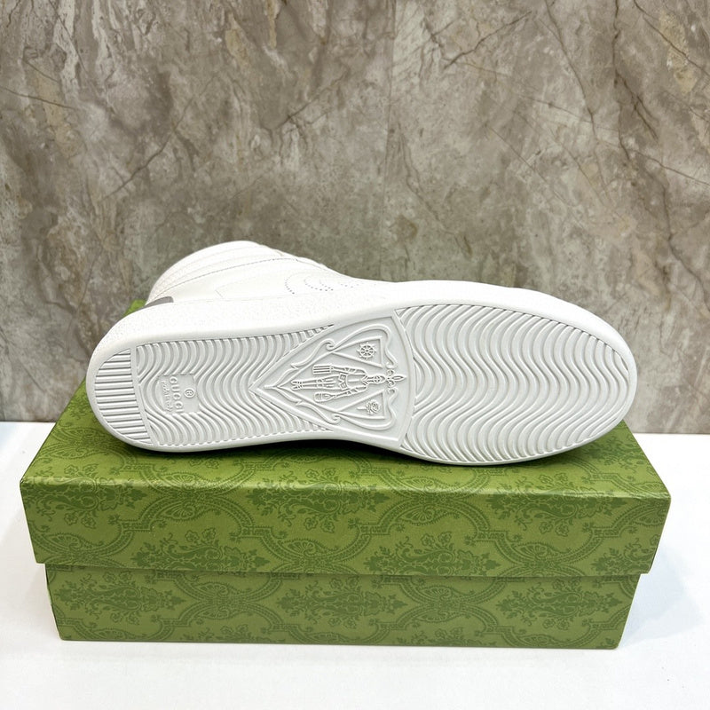 Side profile of Gucci crisp white sneakers everyday casual design