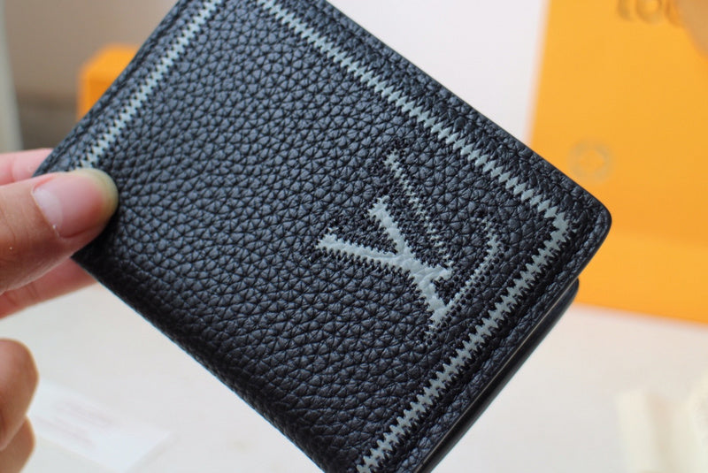 Side profile of classic signature women's handbag – women's premium purse