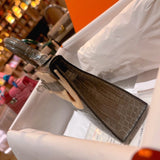 Side view of statement structured handbag