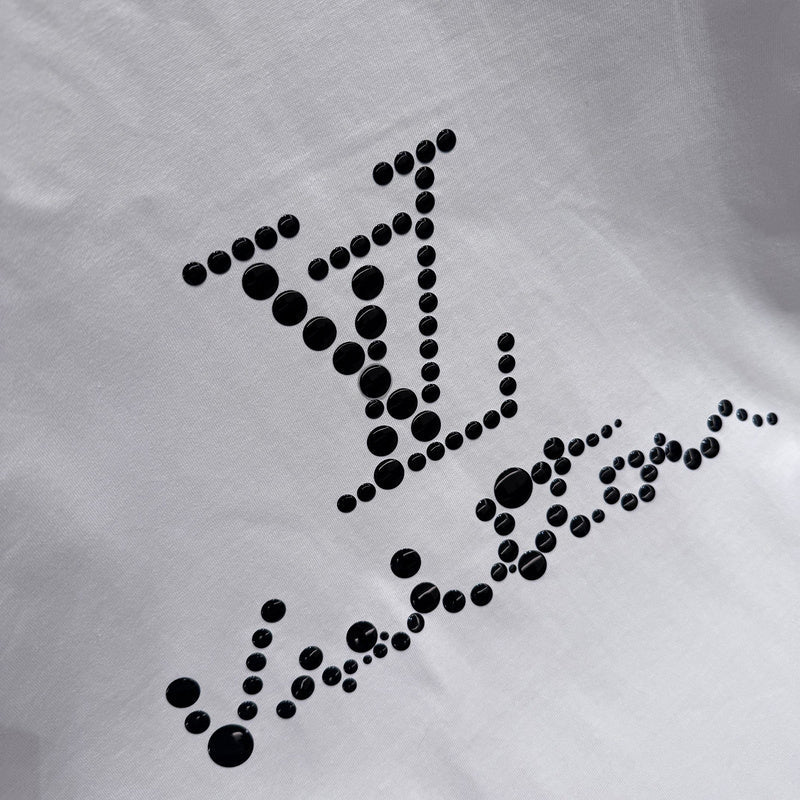 Flat lay presentation of Louis Vuitton cotton t-shirt with logo-detail design