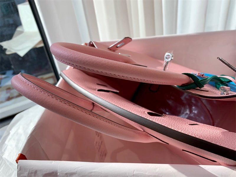 Side view of sleek structured handbag