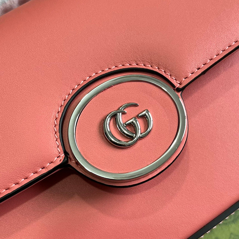Handle and strap detail of statement polished women's handbag – women's everyday handbag