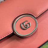 Handle and strap detail of statement polished women's handbag – women's everyday handbag