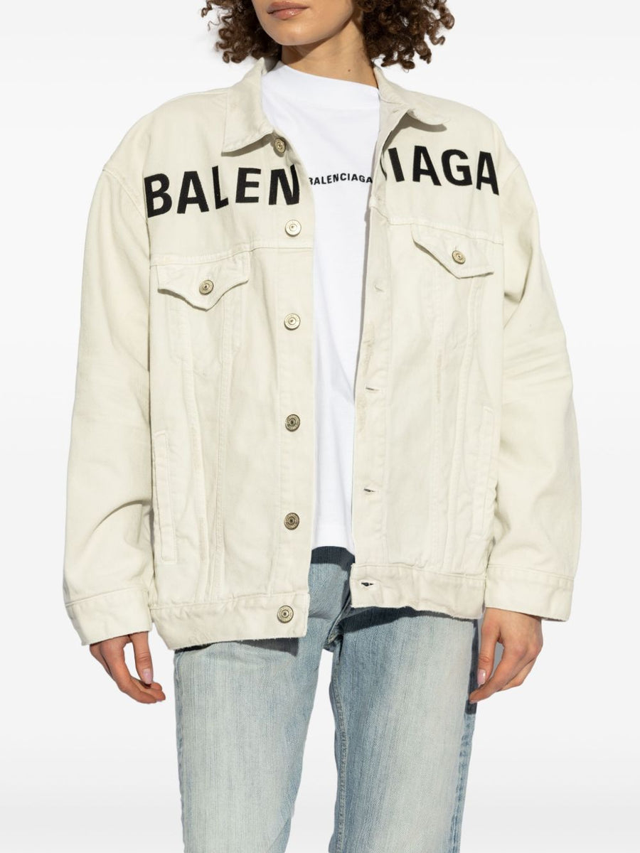 Close-up of Balenciaga outerwear hardware and fine stitching