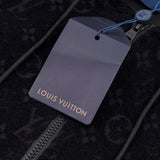 Flat lay presentation of Louis Vuitton luxury clothing with everyday silhouette