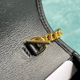 Close-up detail of polished classic women's handbag – women's luxury handbag