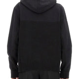 Close-up of Alexander McQueen sweaters & pullovers hardware and fine stitching