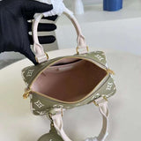 Front view of polished chic women's handbag – women's designer-style accessory
