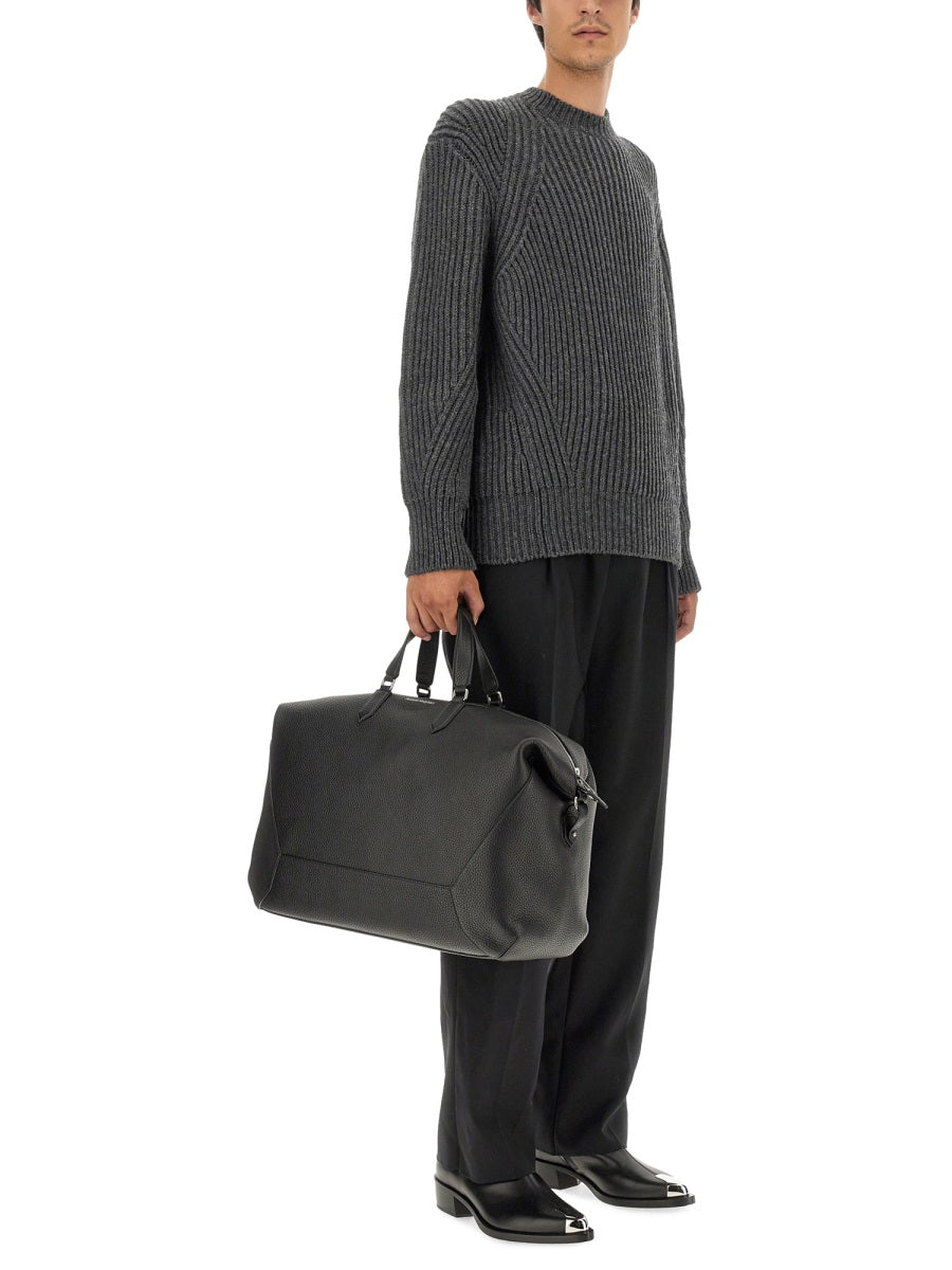 Alexander McQueen premium pants detail and craftsmanship close-up