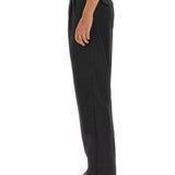 Close-up of Alexander McQueen pants hardware and fine stitching