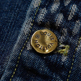 Close-up detail shot of Louis Vuitton luxury clothing with tailored silhouette