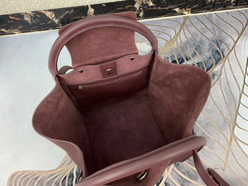 Side profile of signature statement women's handbag – women's premium purse