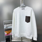 Front view of Louis Vuitton luxury clothing with label-forward styling