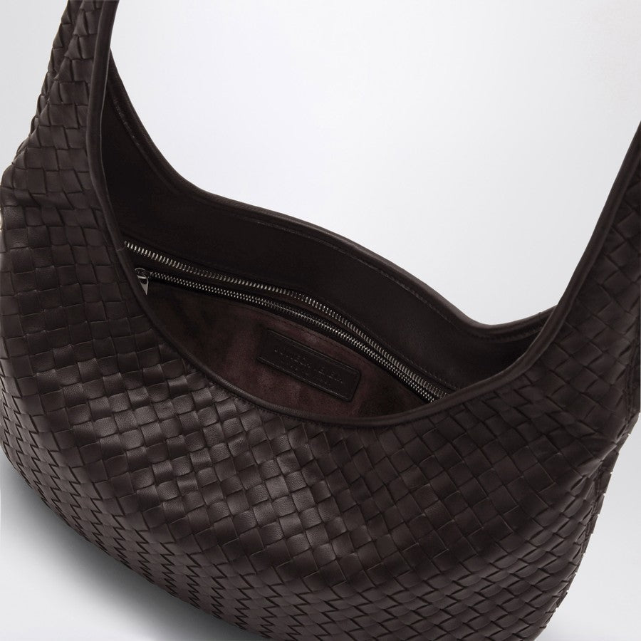 Close-up of Bottega Veneta shoulder bags hardware and fine stitching