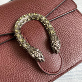 Back view of signature chic women's handbag – women's luxury accessory