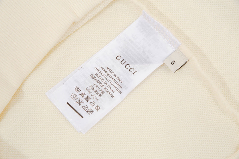 Close-up detail shot of Gucci luxury clothing with everyday silhouette