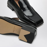 Bottega Veneta flats lifestyle shot premium designer piece