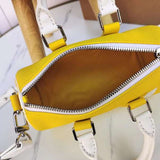 Side profile of premium chic women's handbag – women's statement bag