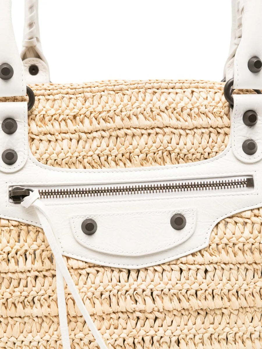 Close-up of Balenciaga handbags hardware and fine stitching