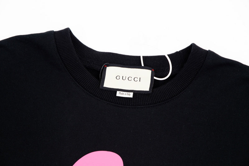 Close-up detail shot of Gucci luxury clothing with relaxed-fit cut