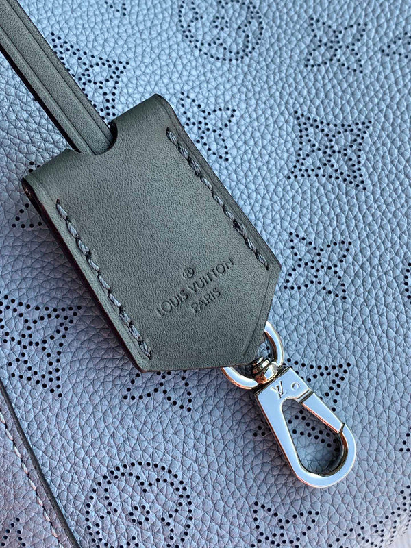 Handle and strap detail of statement elevated women's handbag – women's designer-style accessory