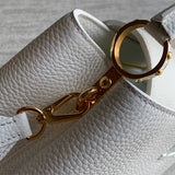  crossbody bag close-up of hardware and finish 29