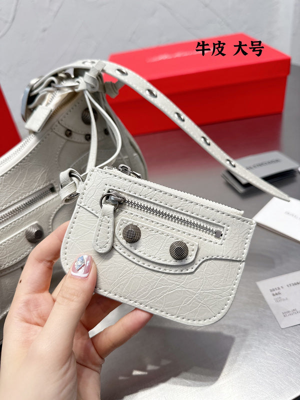 Ziva's Charm handbag – styled view (one versatile size)