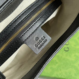Handle and strap detail of classic everyday-luxe women's handbag – women's designer-style accessory