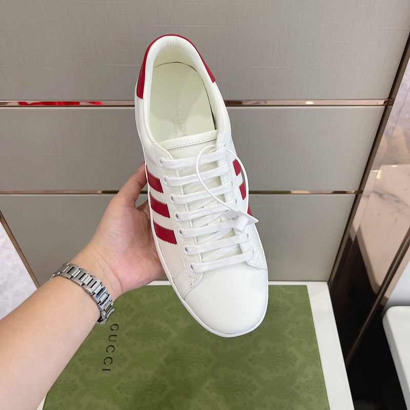 Gucci two-tone luxury sneakers view 7 signature lace-up style